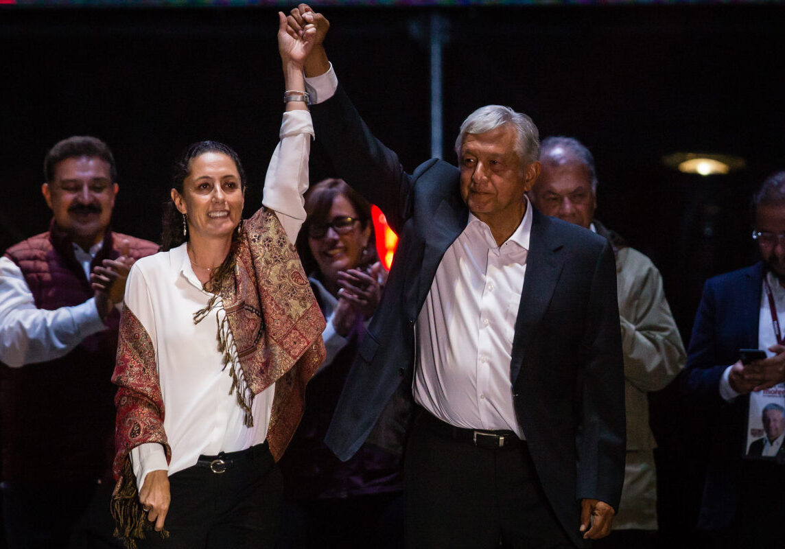 MEXICO CITY, MEXICO - JUNE 27: Claudia Sheinbaum (L), candidate for mayor of Mexico City and Andres Manuel Lopez Obrador (R), candidate for President of Mexico attend the final event of the 2018 Presidential Campaign at Azteca Stadium on June 27, 2018 in Mexico City, Mexico. (Photo by Manuel Velasquez/Getty Images)